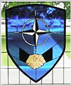NATO Shield on Stained Glass Window