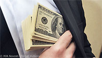 Hand Pushing Pile of Cash Into Suit Inside Pocket