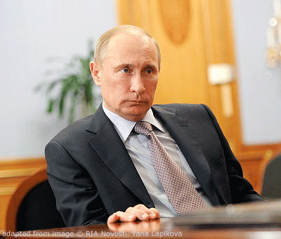 File Photo of Vladimir Putin at Desk
