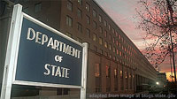 File Photo of State Department at Dusk, with Illuminated Sign